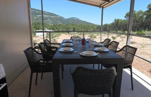 Robinson olive tree huts - Photo 1