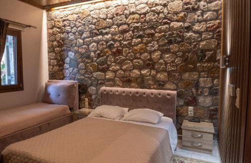 Liontos Rooms - Photo 17