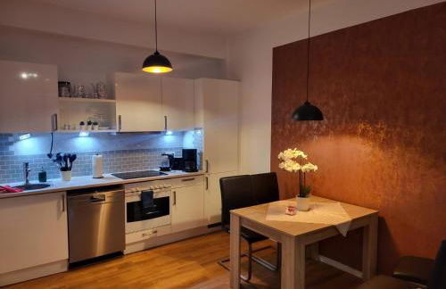 Trendige Stadtwohnung, historisches Haus mit Terrasse und Garten - Foto 6