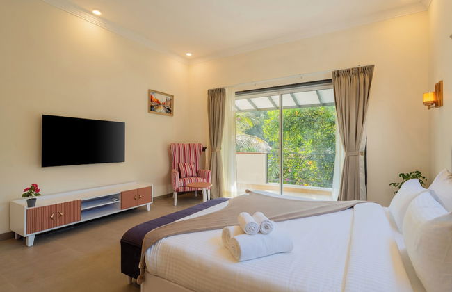 ELIVAAS Laguna Camellia | Luxe 4 BHK Villa Near Popular Beaches with Private Pool - Photo 27