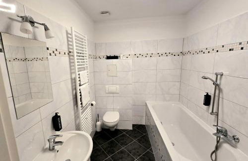 Boardinghouse mit 10 großen Apartments mit Parkplatz und Balkon - Photo 59