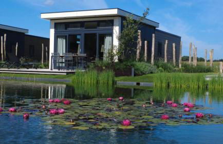 Komforthaus für 6 Gäste mit Terrasse am Wasser - Foto 1