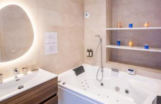 L'Escapade Indigo - Balnéo - Sauna - Foto 5