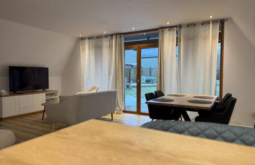 Ferienhaus Reuthsee- Nurdachhaus mit Panoramafenstern, großem Garten & hundefreundlich - Foto 17