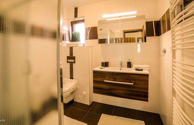 Mucha Apartments - Photo 5