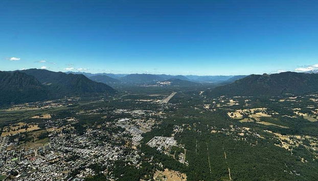 Witness the expansive Pucon Forest from above