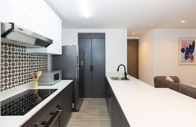 The Acapella Condo by Acomodo - Photo 18