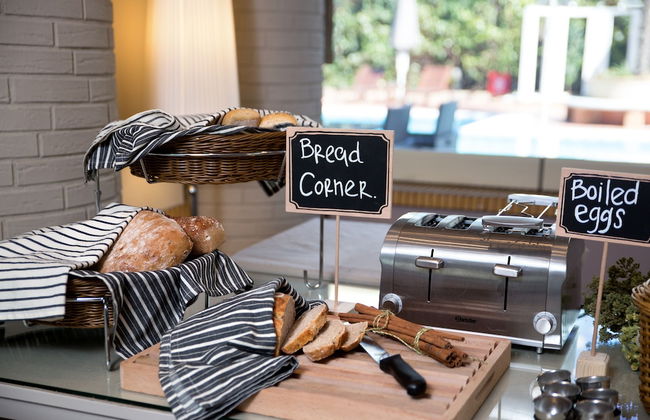 Blazer Suites Hotel - Photo 30