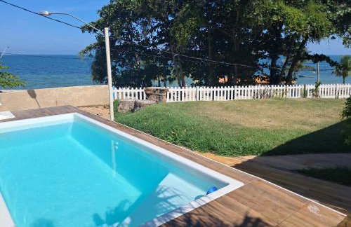 Casa 4 quartos, 2 suítes, piscina e acessibilidade - Frente para a lagoa - Foto 1