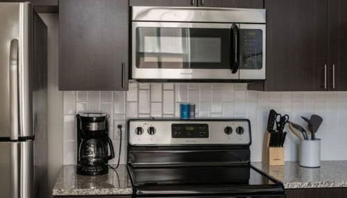 Modern Industrial Apartment with Skywalk - Photo 4