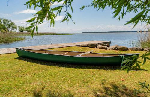 Ferienhaus Peeneblick - exklusives Traumhaus in Direktlage am Wasser mit Bootssteg und Aussensauna - Foto 8