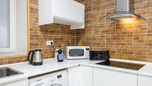 Cuatro Caminos Apartment - Photo 4, stove, toaster