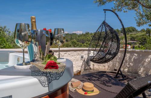 Uniquely designed Villa Ivana with outdoor Jacuzzi nearby the pebble Banje beach at the Island of Solta - Photo 9
