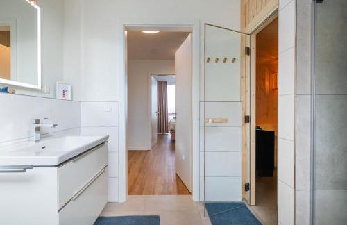 Hygge – Familienfreundliche Ferienwohnung mit Garten & Meerblick - Foto 11