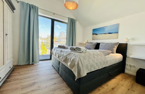 Ferienwohnung Sonnendeck Parkvillen Carlota und Candela Baabe - Photo 12