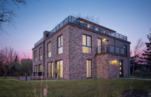 Villa Lotsenhäuser Rügen - Luxus Ferienhaus - 3 Schlafzimmer - Sauna - Dachterrasse mit Boddenblick - Foto 1