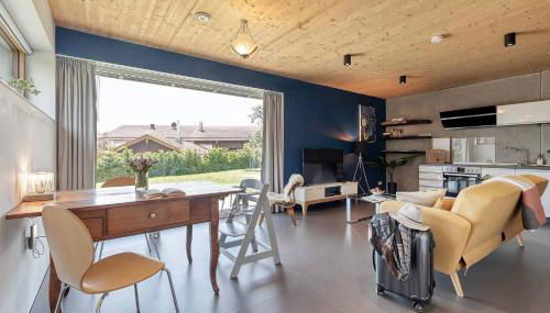 LIEBLINGSECK nachhaltige 5-Sterne Ferienwohnung - Direkt am Chiemsee - Foto 2, Garden view