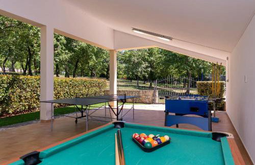 Einzigartige Villa mit Salzwasserpool, Panoramablick, Bikes, Trampolin, Tischtennis - Foto 29