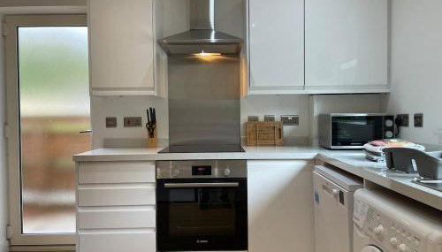 Iris Cottage 4BR Coastal Retreat - Foto 4, stove, toaster