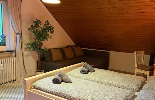 Holziges Dachgeschoss-Apartment - Foto 7