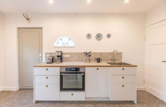 Reetgedecktes Ferienhaus mit Kachelofen - Foto 8