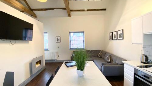 Loft at The Coach House Apartments - Foto 4
