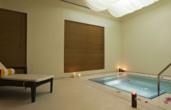 Magnum Hotel & Suites West Bay - Foto 17