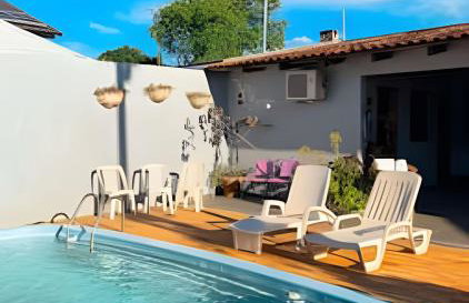 Casa com 2 suites e 1quarto piscina Ar para 8 hospedes - Foto 106