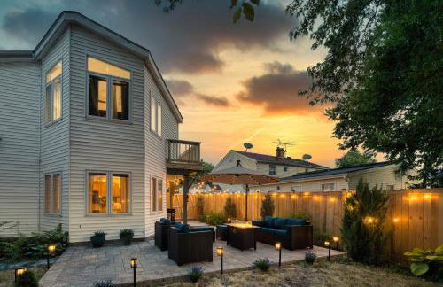 Patio Paradise Stylish 3BR Home with Gaming Room - Photo 1