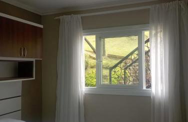 Aconchego Apartamentos da Serra - Photo 15