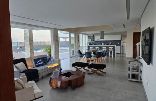 Piscina aquecida, 5 suítes e pé na areia com vista espetacular!! - Photo 42