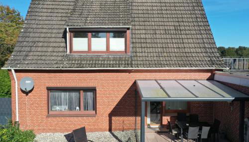 Ferienwohnung im Erdgeschoss mit eingezäunten Garten und Terrasse - Photo 5, Garden, Garden view