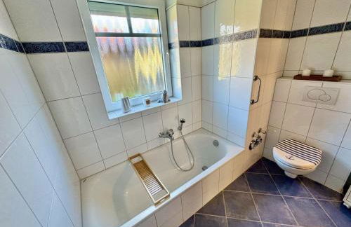 FeWo Kuestenliebe direkt am Strand mit eingez Garten - Foto 10