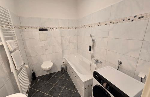 Boardinghouse mit 10 großen Apartments mit Parkplatz und Balkon - Photo 8