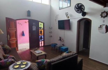 Casa Rosa de Peruíbe - Casa de Temporada 3 dormitórios, 10 hóspedes, piscina, wi-fi, netflix, 800 metros da praia - Photo 9
