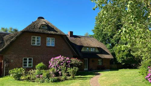 Stilvolle Ferienwohnung unter Reet in Windbergen - Foto 3