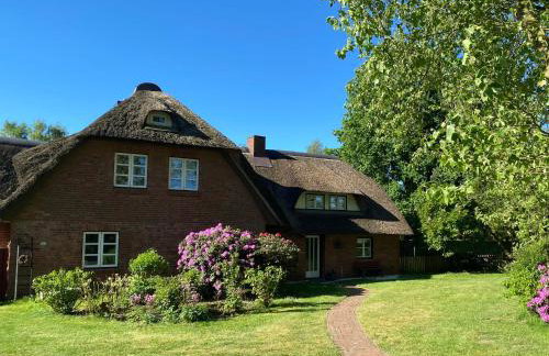 Stilvolle Ferienwohnung unter Reet in Windbergen - Foto 3