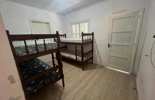 Casa Imbé - Acomoda 12 Pessoas - Foto 5