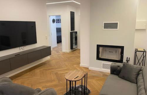Neubau Apartment mit Kamin und Terrasse in Premium Lage Parkplatz inklusive - Foto 16