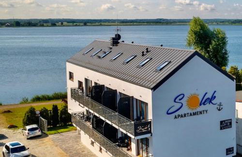 SOLEK, Apartamenty hotelowe i pokoje gościnne ze śniadaniem, przyjazne zwierzętom, wyjątkowe, z widokiem na Jezioro Jamno i w bardzo bliskiej odległości od morza - Foto 1