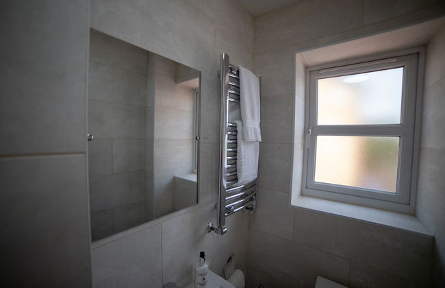 The Coach House by Riis Property - Photo 27