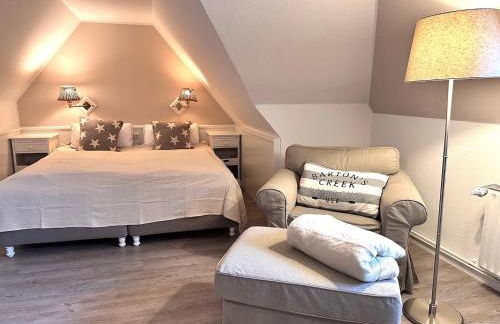 Sky & Sand Homes Strandläufer I Stilvolle Wohnung unter Reet in SPO mit Parkgarten - Photo 4