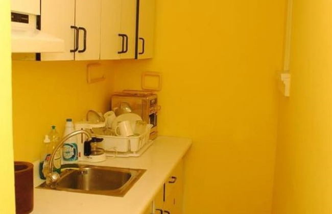 Point Village Studios and Suites - Photo 26