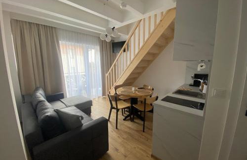 SOLEK, Apartamenty hotelowe i pokoje gościnne ze śniadaniem, przyjazne zwierzętom, wyjątkowe, z widokiem na Jezioro Jamno i w bardzo bliskiej odległości od morza - Foto 31