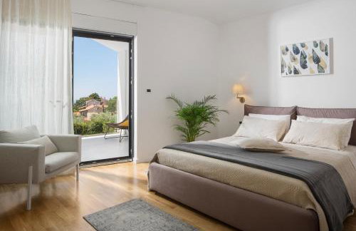 Villa Mariva for 8 persons near Porec with 44 m2 heated pool, sea view, fitness & kids playground - Foto 18