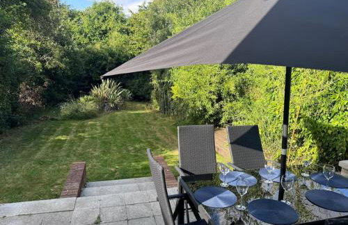 Spacious 15 Guest Home With 9 Beds in Shirley - Photo 17