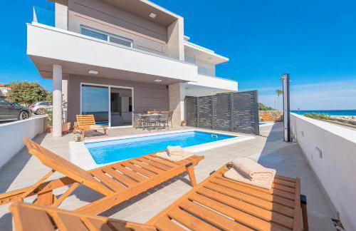 Villa Eni Beachfront apartment with pool - Photo 5