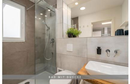 Apartment Leinetal mit Kamin & Kaminholz, 1-3 Personen , Schlafzimmer mit Boxspringbett 180x200 & hochwertige Hotelbettwäsche, bequemes Einzelbett im Wohnzimmer, Terrasse, Einbauküche, - Photo 10