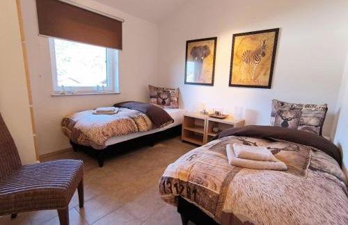 Luxuriöses, familienfreundliches Ferienhaus ,,Amy,, mit Whirlpoolwanne, Kamin und Garten - Foto 44