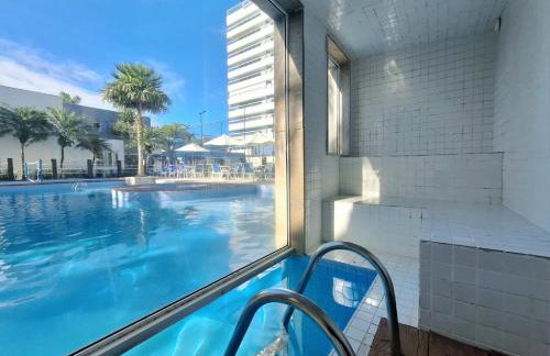 Apto em Bertioga com Piscina a 1 min da Praia no Indaiá - Foto 25